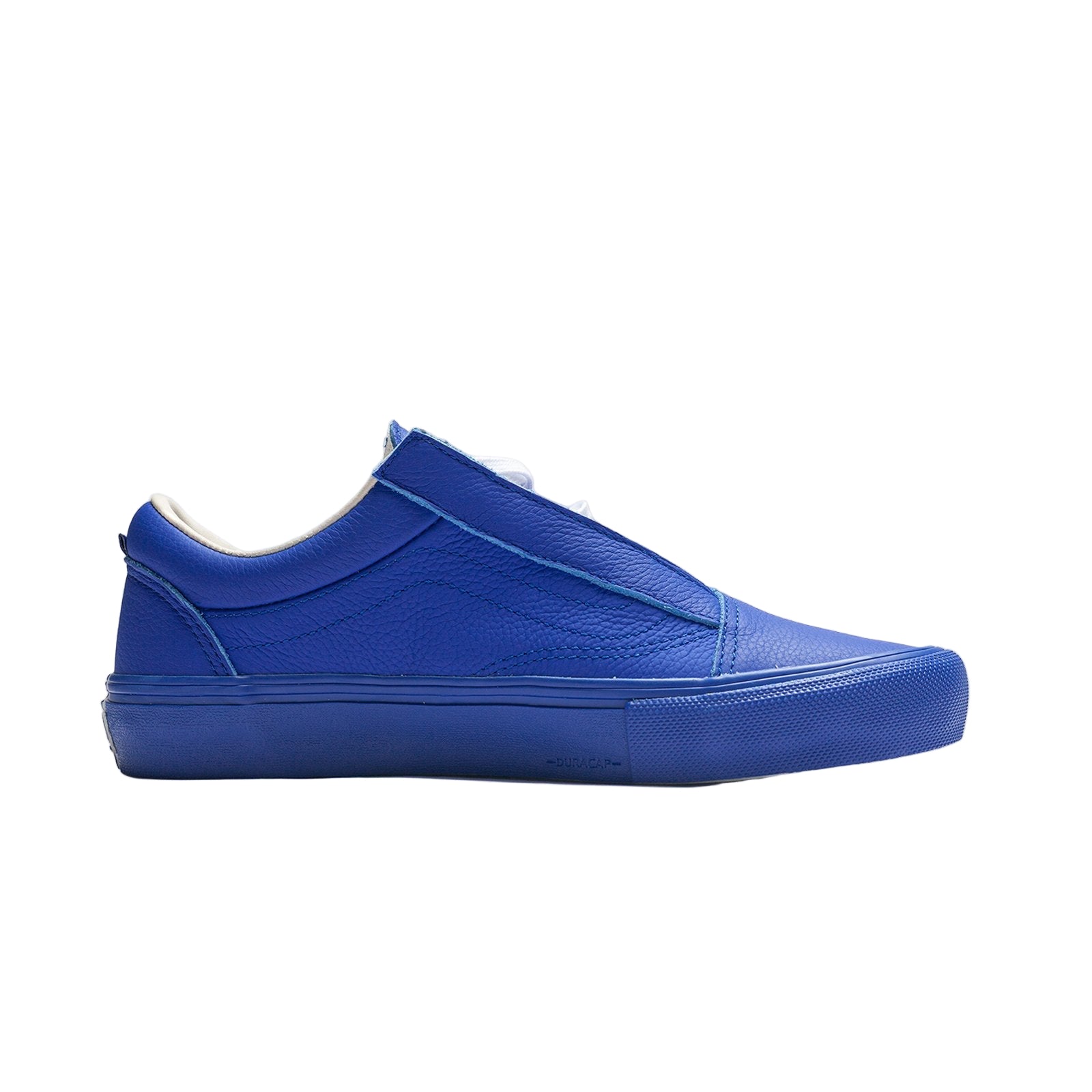 Blue slip-on sneaker on a light gray background