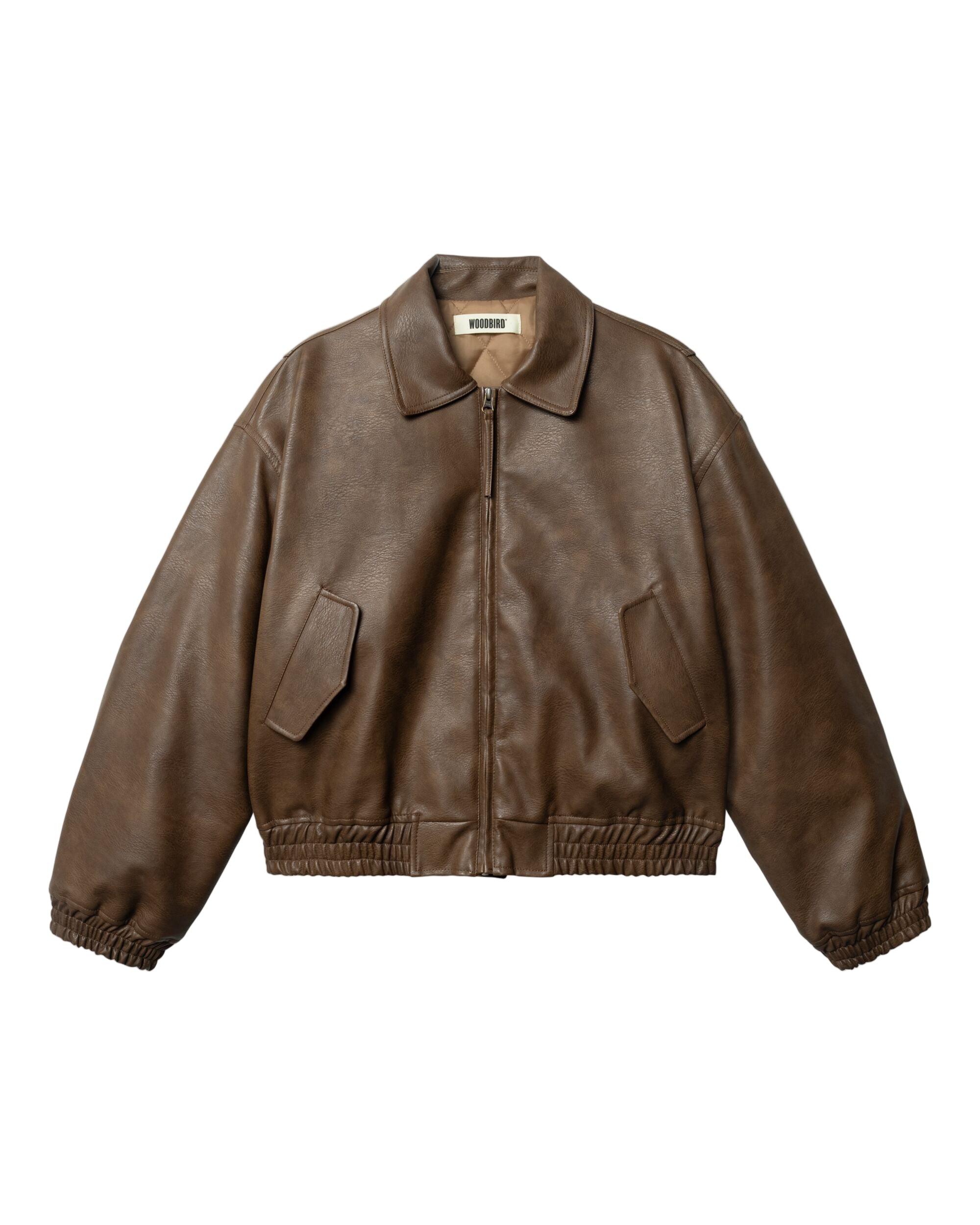 Brown leather jacket on a beige background