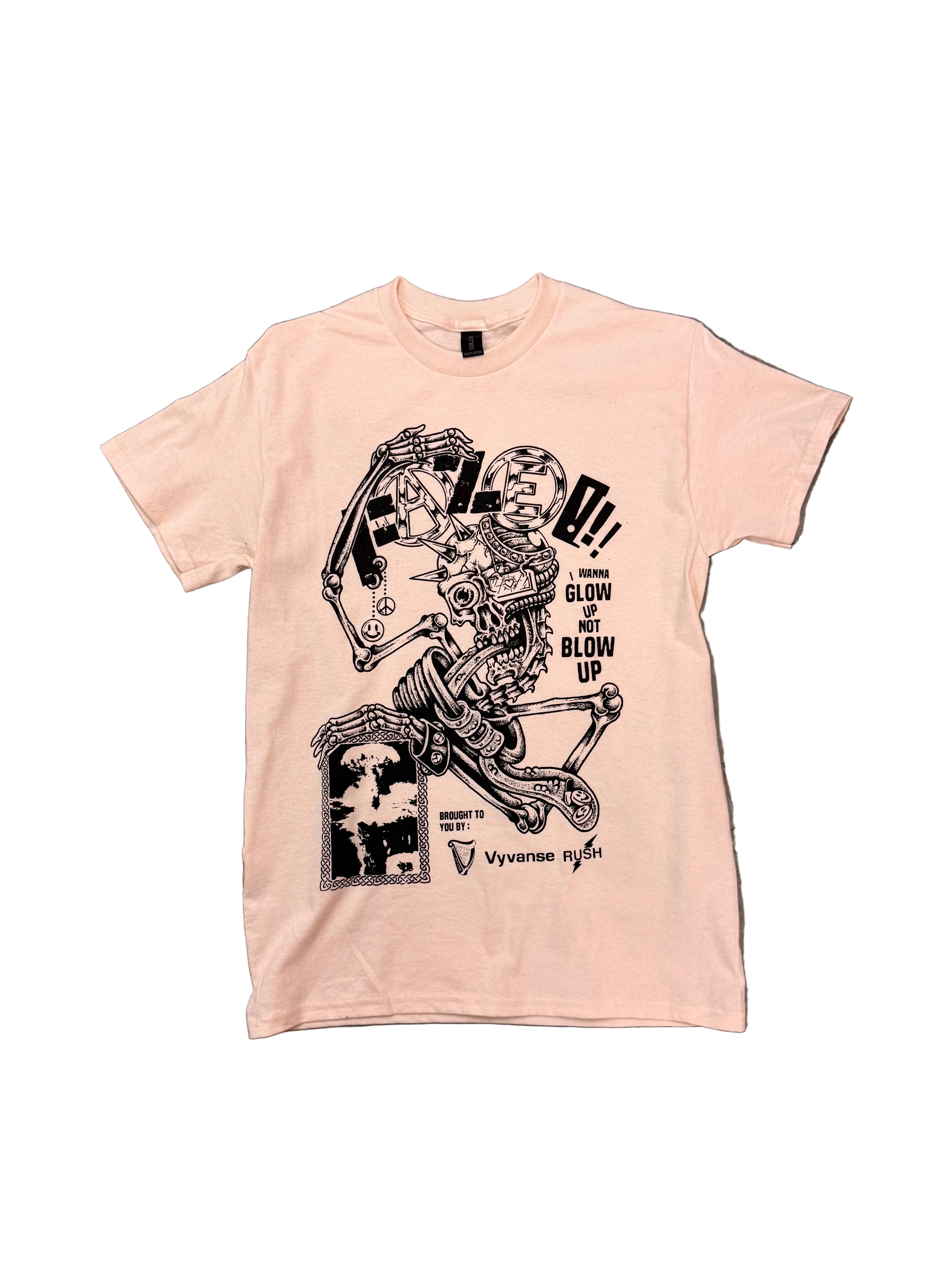 Natural cotton tee with black print. Graphic is of a skeleton with metal parts and a mushroom cloud with the text 