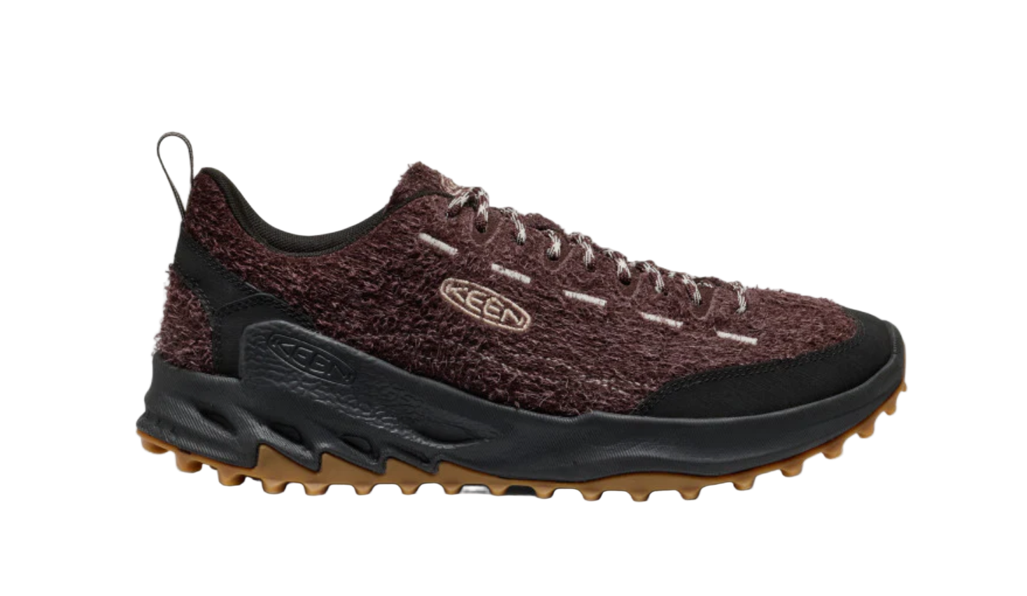 Brown and black sneaker with KEEN logo on a white background