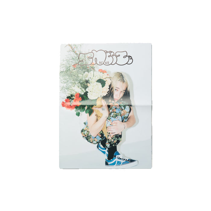 Product packaging with a person holding flowers on a white background