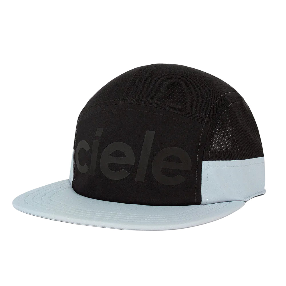 A black and light blue Ciele 5-panel cap with a flat brim, shown on a clean white background.