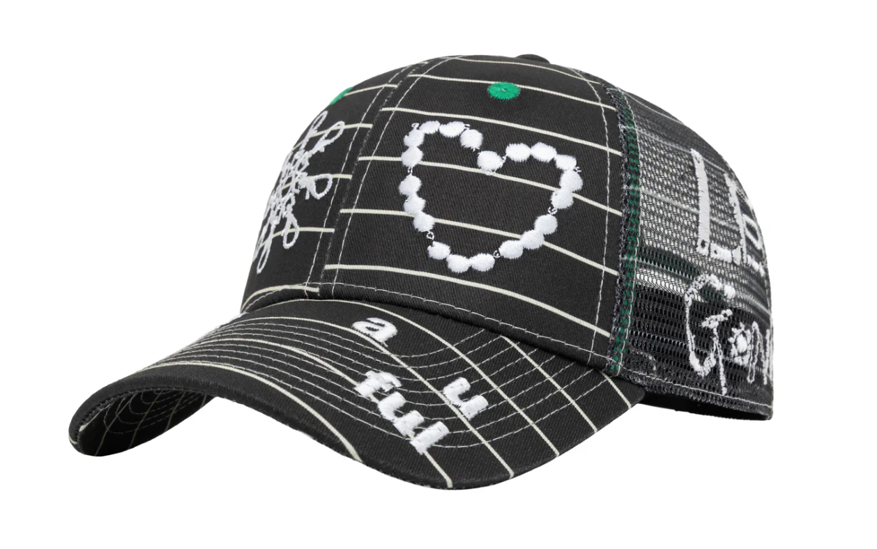 A black trucker-style baseball cap with white graphic text and a heart outline on the front, shown against a plain white background.
