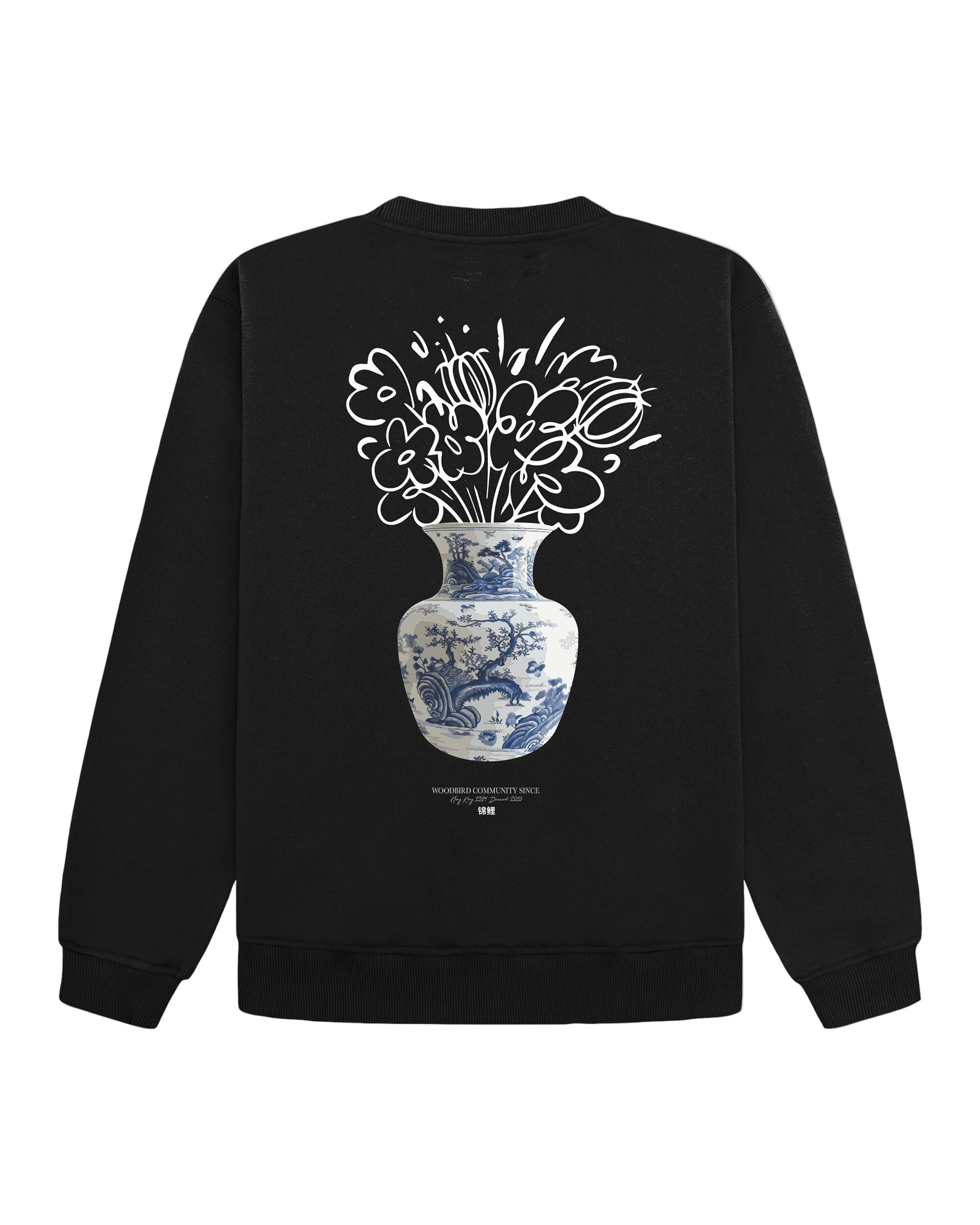 Black sweatshirt with a white floral design on the back against a beige background