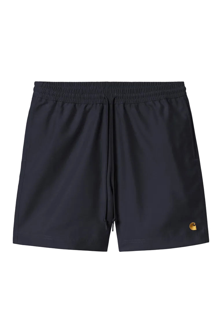 Black shorts with a gold logo on a white background