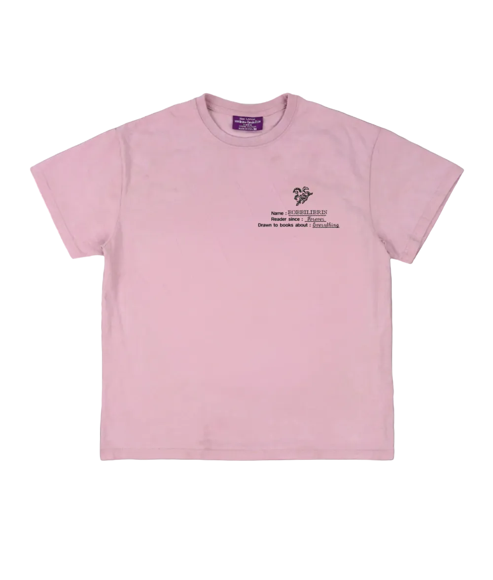 Pink t-shirt with text and graphics on a black background