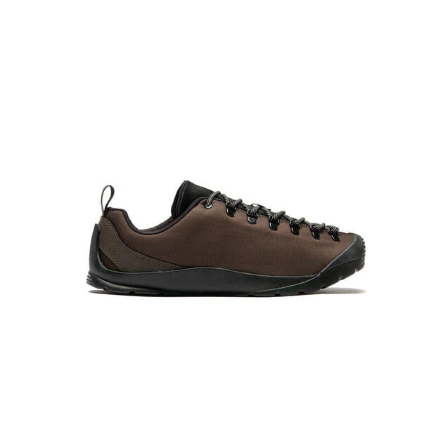 A low-top brown and black outdoor shoe shown in a side profile on a clean white background.