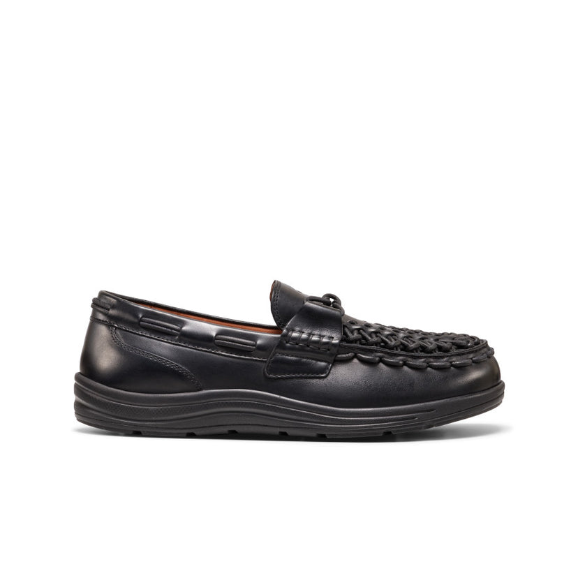 KEEN Men's UNEEK Loafer in Nocturnal Black, featuring a premium leather upper, slip-on construction, and distinctive cow-print design.