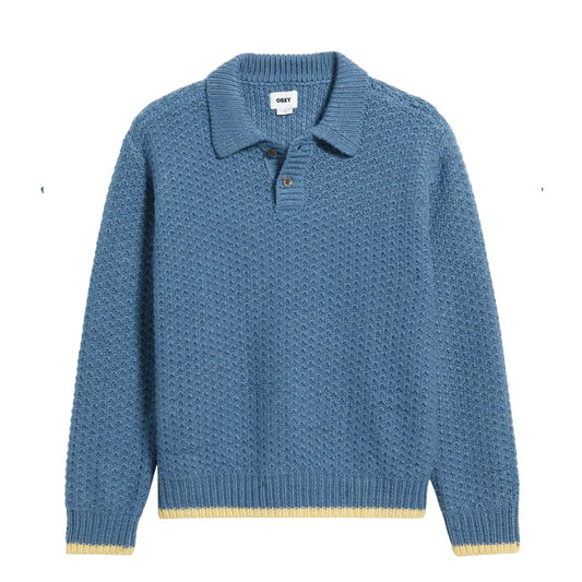 Blue knitted sweater with a collar on a white background