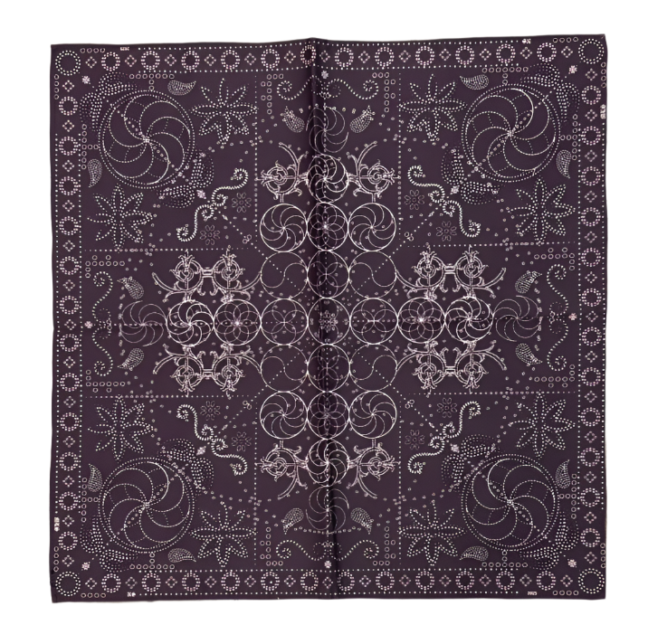 Purple bandana with white patterns on a tiled floor