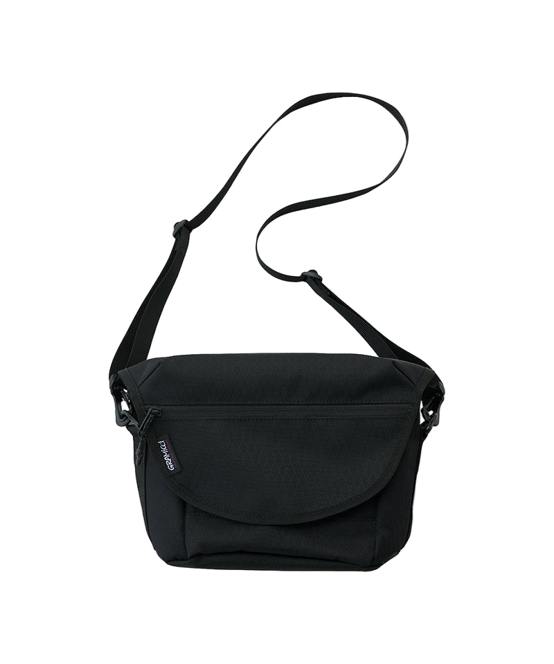 a black messenger bag on white background